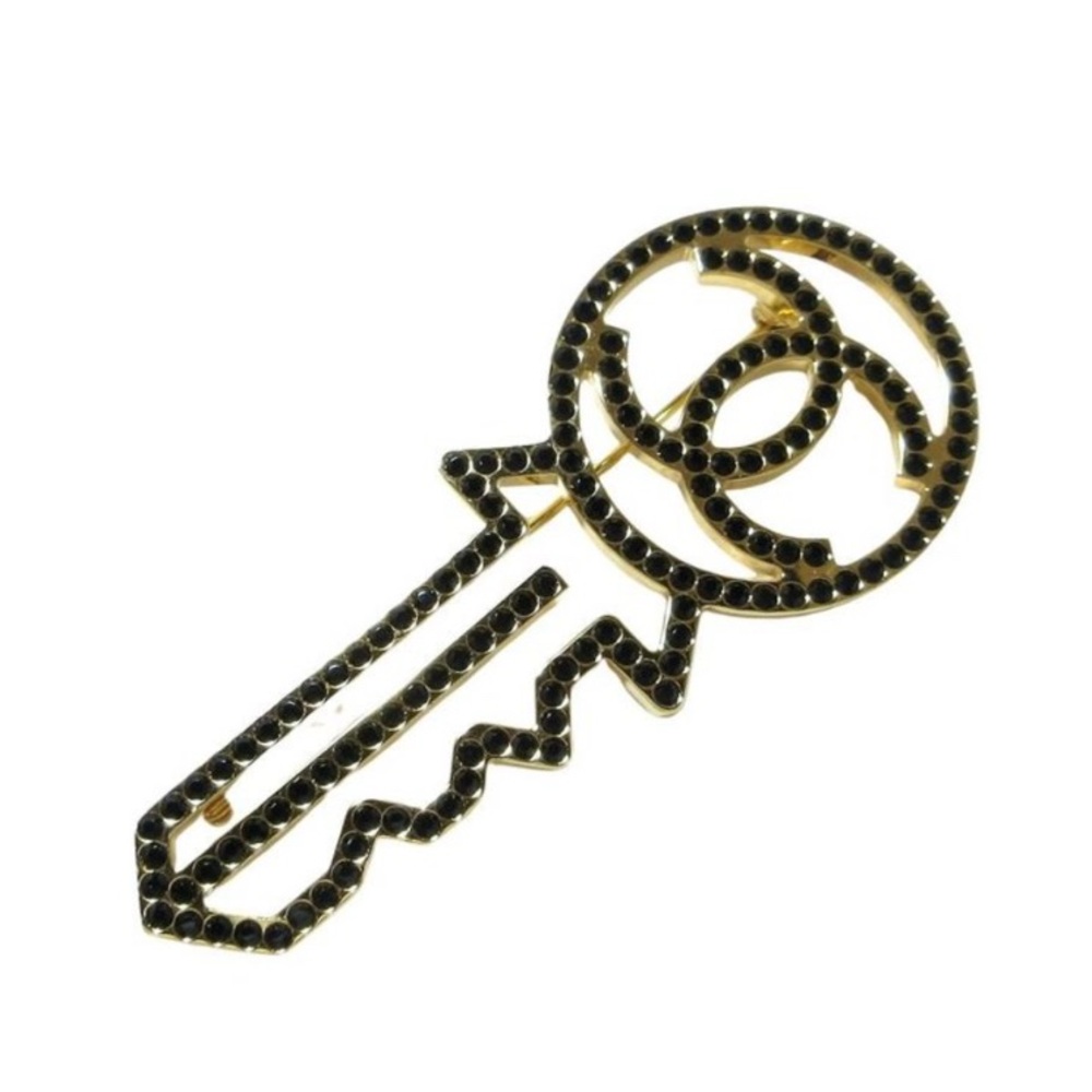CHANEL Black and Gold Key-Shaped Brooch